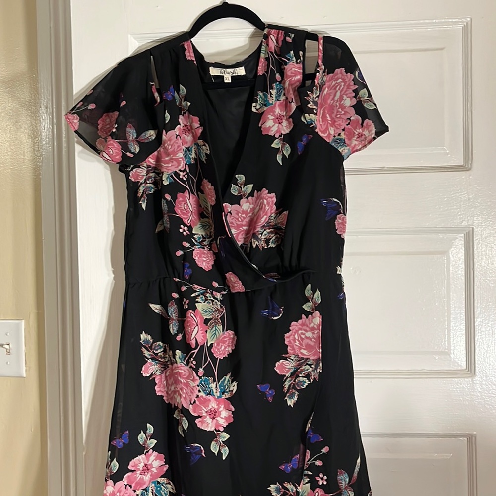 Cold shoulder flowy wrap style dress.